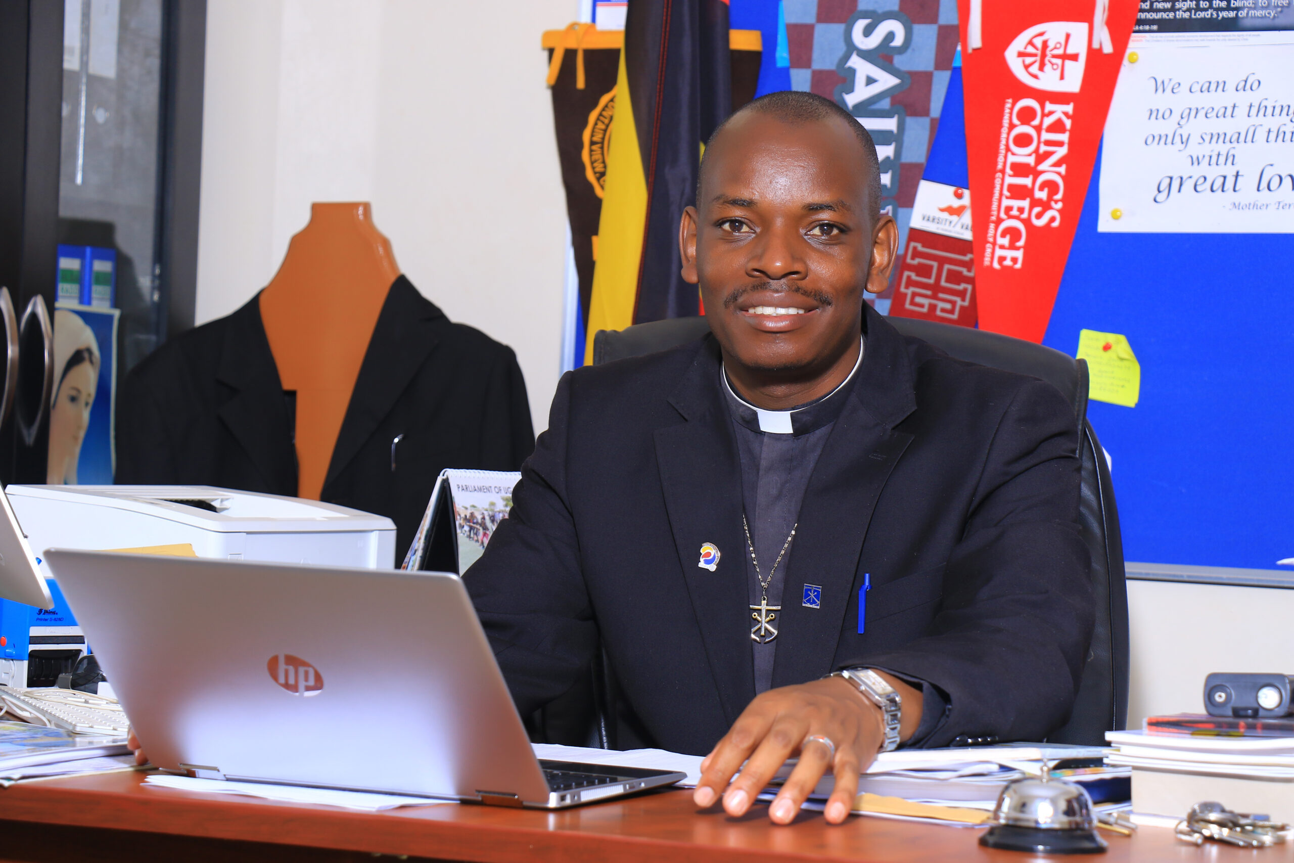 Rev. Fr. Prosper M. Atukwatse, C.S.C - Headteacher of Holy Cross Lake View S.S.S Wanyange