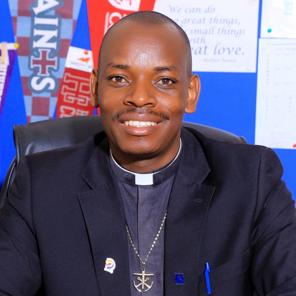 Rev. Fr. Prosper M. Atukwatse, C.S.C.